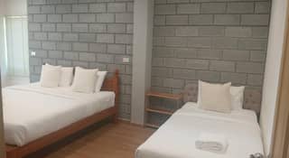 เตียงภายในห้อง Superior Triple - Zayn Hotel สมุย